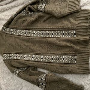 Detailed brown mock neck sweater